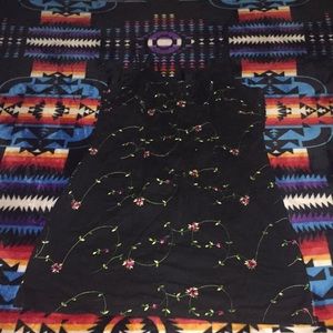 Black spaghetti strap minidress with floral print